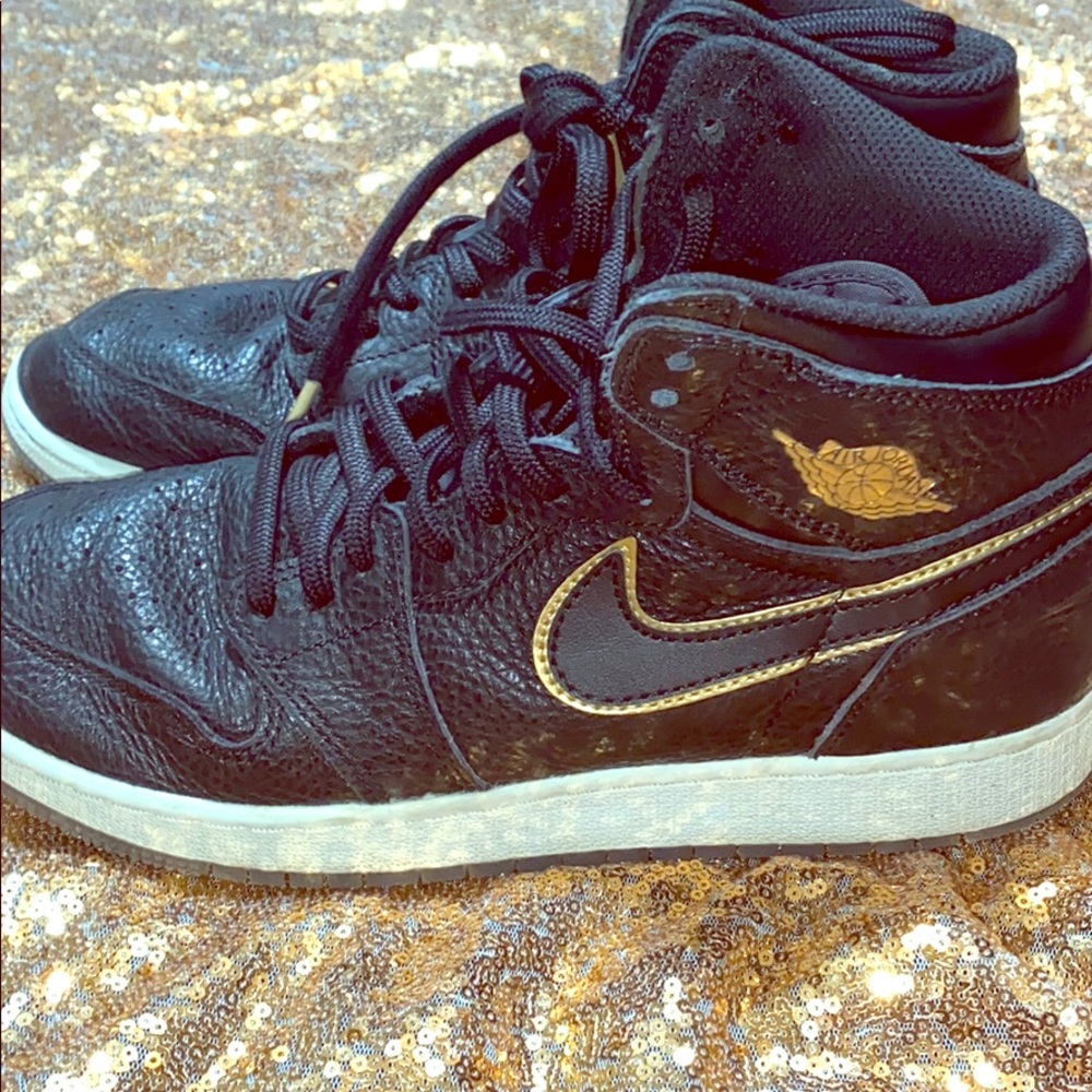KID BLACK AND GOLD AIR JORDANS